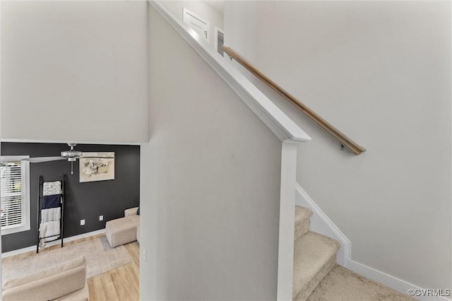 3821 Meridian Ave, Richmond, VA 23234 - stairway featuring ceiling fan, wood finished floors, and baseboards
