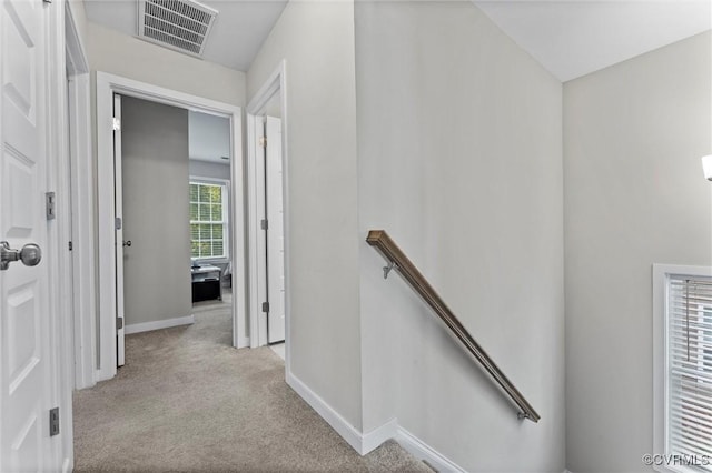 3821 Meridian Ave, Richmond, VA 23234 - hall with an upstairs landing, carpet flooring, and baseboards