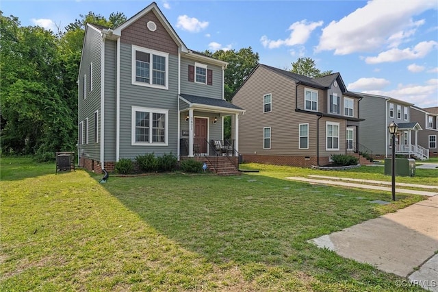 3821 Meridian Ave, Richmond, VA 23234 - view of front of house with a front lawn, covered porch, and a residential view