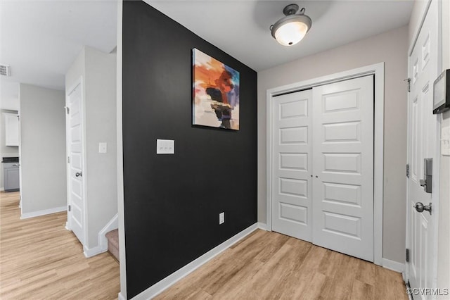 3821 Meridian Ave, Richmond, VA 23234 - entrance foyer with light wood-style floors and baseboards