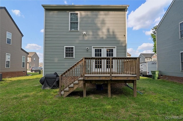3821 Meridian Ave, Richmond, VA 23234 - rear view of house featuring a deck and a lawn