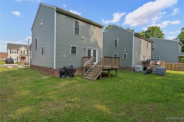 3821 Meridian Ave, Richmond, VA 23234 - rear view of property with a wooden deck, a yard, central AC unit, and crawl space