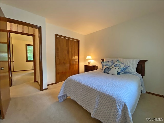 1849 Duke Of Gloucester St, Colonial Heights, VA 23834 - bedroom featuring light colored carpet, baseboards, and a closet