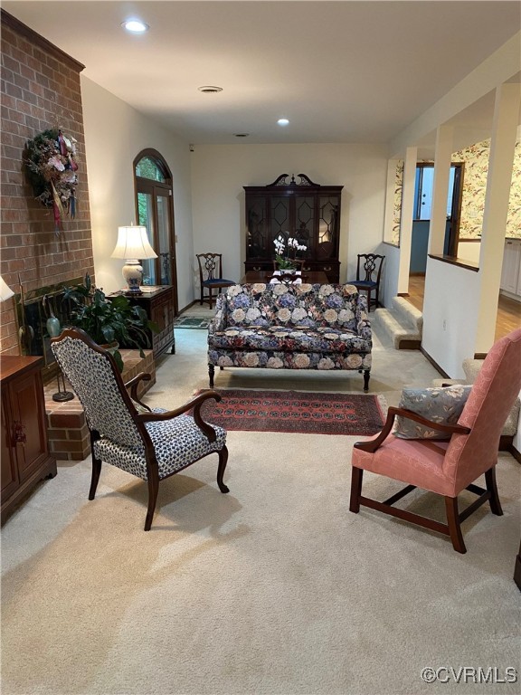 1849 Duke Of Gloucester St, Colonial Heights, VA 23834 - living room with light colored carpet, a fireplace, and recessed lighting