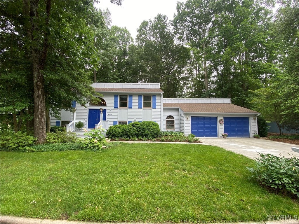 1849 Duke Of Gloucester St, Colonial Heights, VA 23834 - view of front of property with an attached garage, concrete driveway, and a front yard