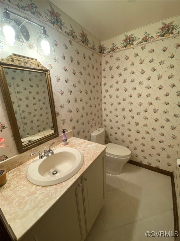1849 Duke Of Gloucester St, Colonial Heights, VA 23834 - half bath featuring vanity, wallpapered walls, tile patterned flooring, toilet, and baseboards