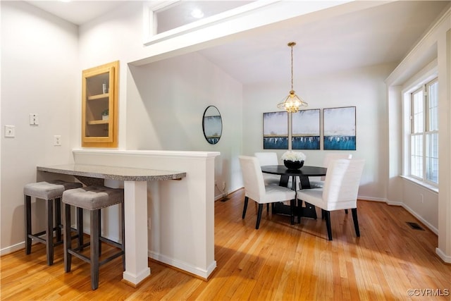 14000 Shady Pointe Ct, Midlothian, VA 23112 - dining room with light wood-type flooring and baseboards