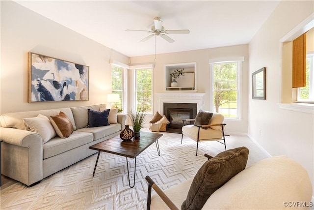 14000 Shady Pointe Ct, Midlothian, VA 23112 - living room featuring a ceiling fan, healthy amount of natural light, a fireplace with flush hearth, and light colored carpet