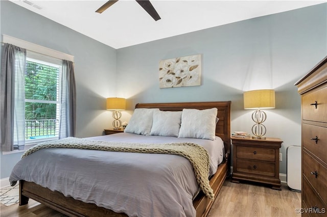9300 Adkins Rd, Charles City, VA 23030 - bedroom featuring wood finished floors, baseboards, and ceiling fan