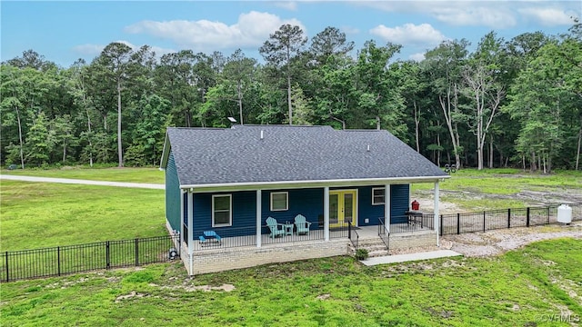 9300 Adkins Rd, Charles City, VA 23030 - rear view of property featuring covered porch, french doors, roof with shingles, and a wooded view