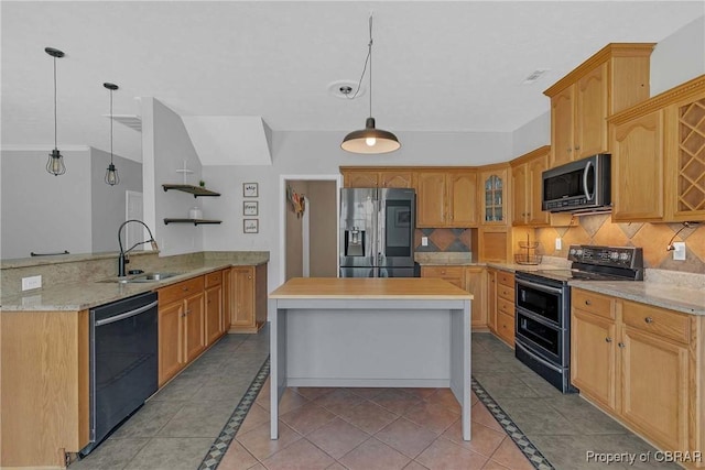 2024 Sarahs Cove Dr, Gloucester, VA 23072 - kitchen featuring appliances with stainless steel finishes, inlaid floor details, and decorative backsplash