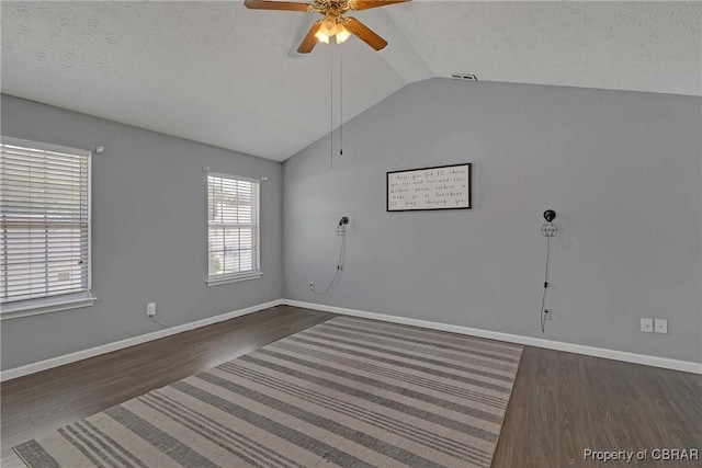 2024 Sarahs Cove Dr, Gloucester, VA 23072 - spare room featuring lofted ceiling, wood finished floors, ceiling fan, and a textured ceiling