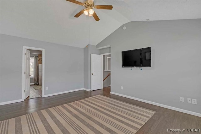 2024 Sarahs Cove Dr, Gloucester, VA 23072 - spare room with vaulted ceiling, a ceiling fan, and dark wood finished floors