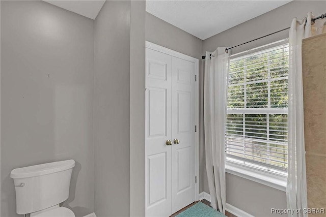 2024 Sarahs Cove Dr, Gloucester, VA 23072 - bathroom featuring toilet and baseboards