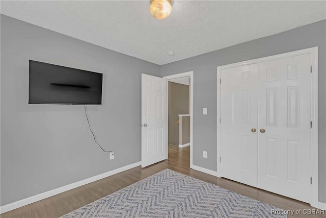 2024 Sarahs Cove Dr, Gloucester, VA 23072 - bedroom with wood finished floors and a closet