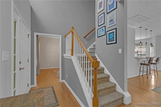 2024 Sarahs Cove Dr, Gloucester, VA 23072 - stairway with wood finished floors and baseboards