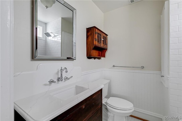 3029 Monument Ave Unit U6, Richmond, VA 23221 - bathroom with vanity, wainscoting, and toilet