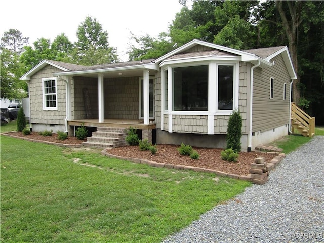135 Trudie Dr, Center Cross, VA 22437 - view of front of house with crawl space, a porch, and a front lawn
