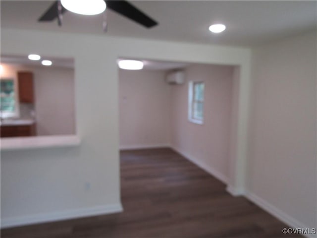 135 Trudie Dr, Center Cross, VA 22437 - unfurnished room featuring a ceiling fan, dark wood-type flooring, a wall mounted AC, and recessed lighting