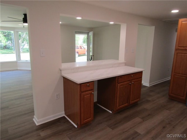 135 Trudie Dr, Center Cross, VA 22437 - kitchen featuring dark wood-style flooring, light countertops, brown cabinets, recessed lighting, and ceiling fan