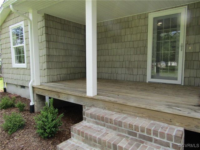 135 Trudie Dr, Center Cross, VA 22437 - view of wooden terrace