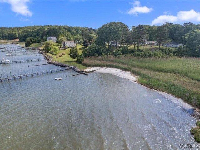 135 Trudie Dr, Center Cross, VA 22437 - bird's eye view of a large body of water and a heavily wooded area