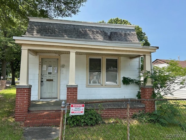 2411 Melbourne St, Richmond, VA 23223 - colonial inspired home with roof with shingles and covered porch