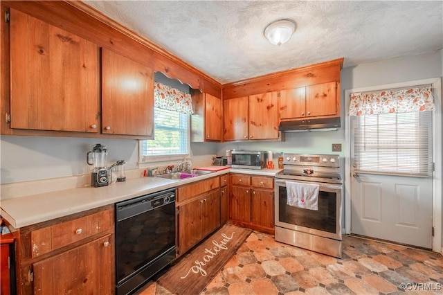 18517 Depot Rd, Mc Kenney, VA 23872 - kitchen with appliances with stainless steel finishes, under cabinet range hood, light countertops, and brown cabinets
