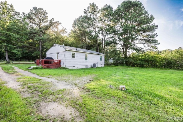 18517 Depot Rd, Mc Kenney, VA 23872 - view of grassy yard featuring a wooden deck and view of scattered trees