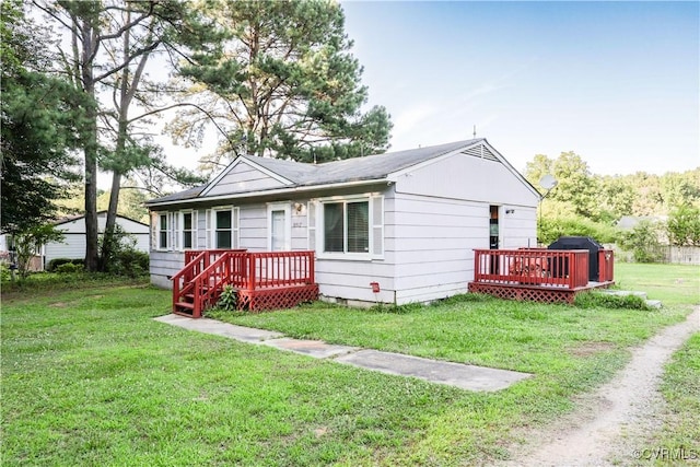 18517 Depot Rd, Mc Kenney, VA 23872 - view of front of property with a deck and a front yard