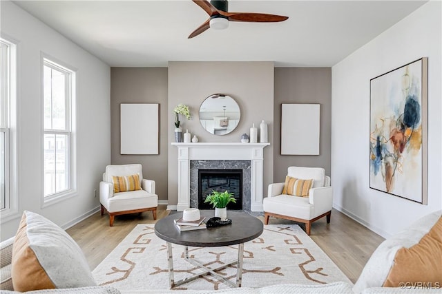 16300 Cambian Ln, Chesterfield, VA 23832 - living room with wood finished floors, ceiling fan, a high end fireplace, and baseboards