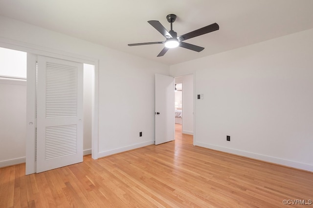 5055 Edgemere Blvd, North Chesterfield, VA 23234 - unfurnished bedroom with light wood-style flooring, baseboards, a ceiling fan, and a closet