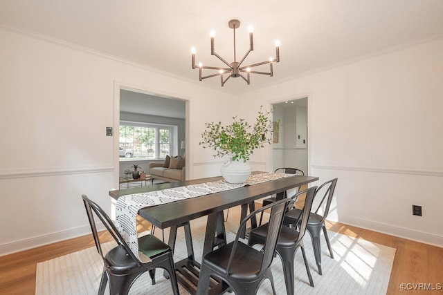 5055 Edgemere Blvd, North Chesterfield, VA 23234 - dining area featuring a chandelier, light wood finished floors, ornamental molding, and baseboards
