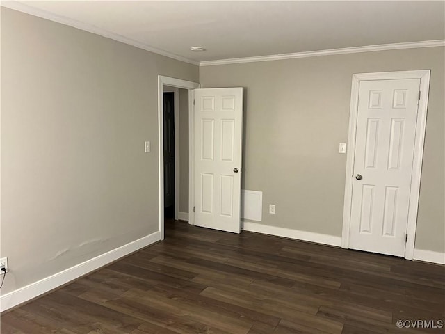1184 Jamestown Rd Unit 19, Williamsburg, VA 23185 - unfurnished room with ornamental molding, dark wood-type flooring, and baseboards