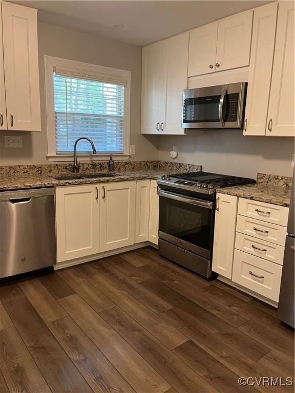 1184 Jamestown Rd Unit 19, Williamsburg, VA 23185 - kitchen with appliances with stainless steel finishes, a sink, dark wood-style flooring, and stone counters