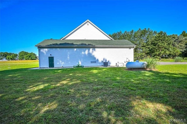 1037 Berryhill Rd, Henrico, VA 23231 - view of side of property with a yard and a cooling unit
