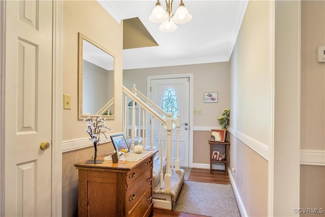 1468 Peppercorn Ln, Suffolk, VA 23432 - foyer entrance with a chandelier, stairs, ornamental molding, dark wood-style floors, and baseboards