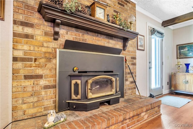 1468 Peppercorn Ln, Suffolk, VA 23432 - detailed view of wood finished floors, a textured ceiling, beam ceiling, crown molding, and baseboards