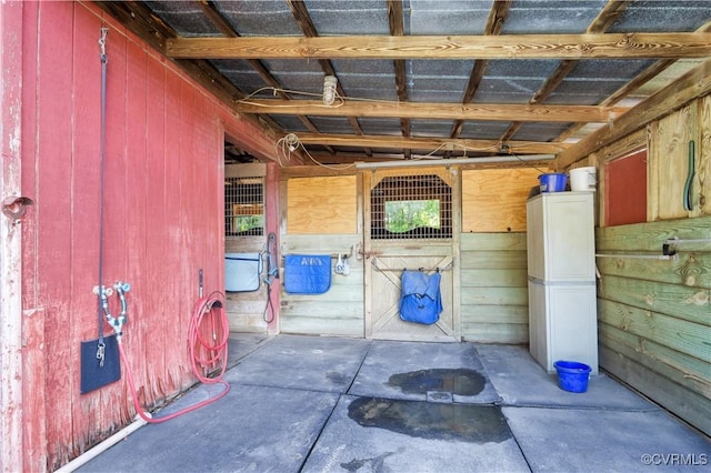 1468 Peppercorn Ln, Suffolk, VA 23432 - misc room with concrete floors and wood walls
