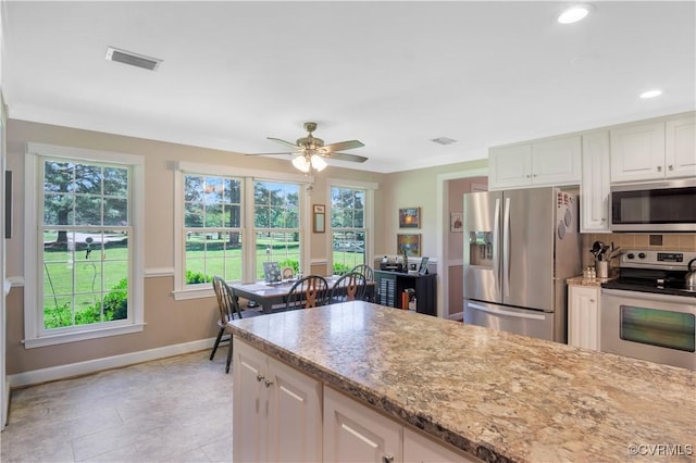 1468 Peppercorn Ln, Suffolk, VA 23432 - kitchen featuring appliances with stainless steel finishes, baseboards, plenty of natural light, a ceiling fan, and recessed lighting