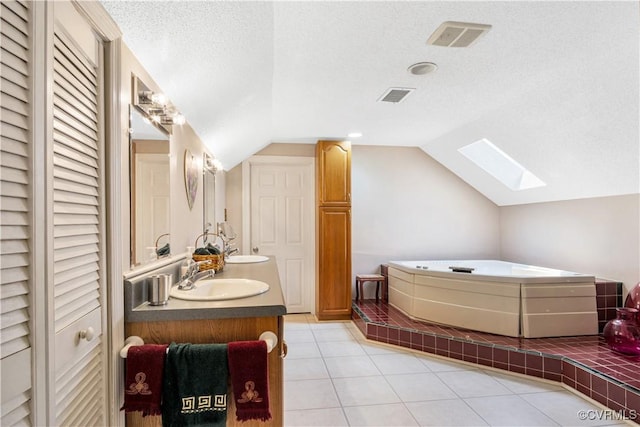 1468 Peppercorn Ln, Suffolk, VA 23432 - full bath with a closet, a skylight, double vanity, lofted ceiling, and a garden tub