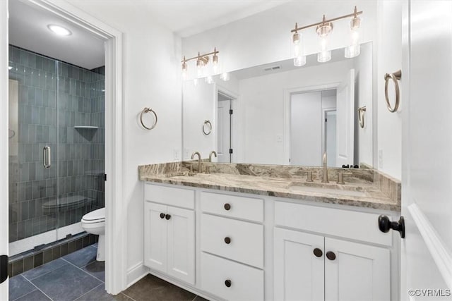 343 Petersburg Rd, Powhatan, VA 23139 - bathroom featuring double vanity, a stall shower, toilet, and tile patterned flooring