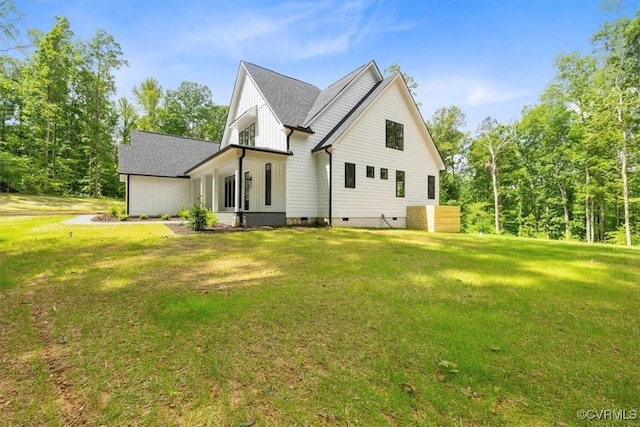 343 Petersburg Rd, Powhatan, VA 23139 - back of property featuring crawl space, a yard, roof with shingles, and board and batten siding