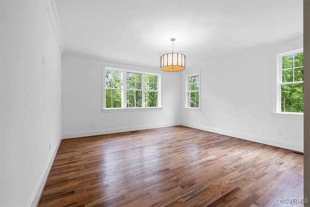 343 Petersburg Rd, Powhatan, VA 23139 - empty room with ornamental molding, wood finished floors, and baseboards
