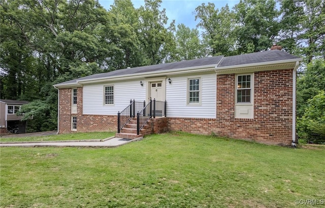 225 Philray Rd, Chesterfield, VA 23236 - view of front of property featuring a front yard, brick siding, and a chimney