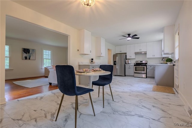 225 Philray Rd, Chesterfield, VA 23236 - dining room with light marble finish floors, baseboards, and ceiling fan