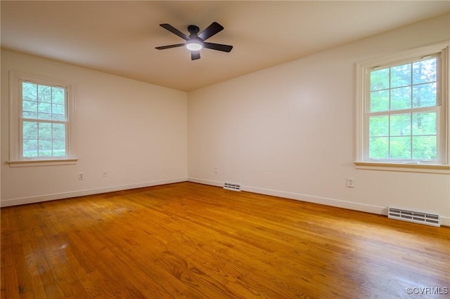 225 Philray Rd, Chesterfield, VA 23236 - spare room with wood finished floors, healthy amount of natural light, and baseboards