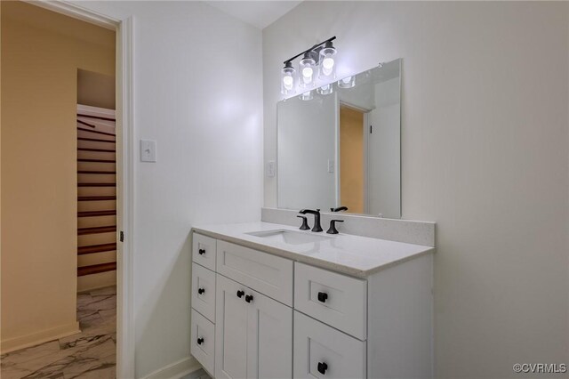 225 Philray Rd, Chesterfield, VA 23236 - bathroom featuring marble finish floors, vanity, and baseboards