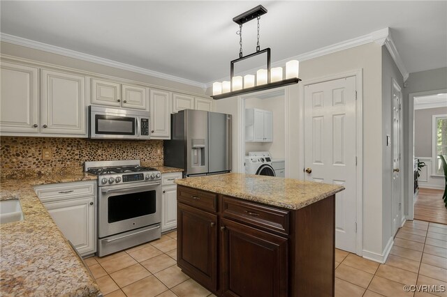 7727 Centerbrook Ct, Chesterfield, VA 23832 - kitchen with stainless steel appliances, light tile patterned floors, crown molding, decorative backsplash, and pendant lighting