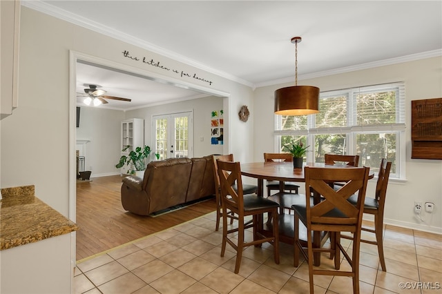 7727 Centerbrook Ct, Chesterfield, VA 23832 - dining space with crown molding, light tile patterned floors, french doors, baseboards, and ceiling fan
